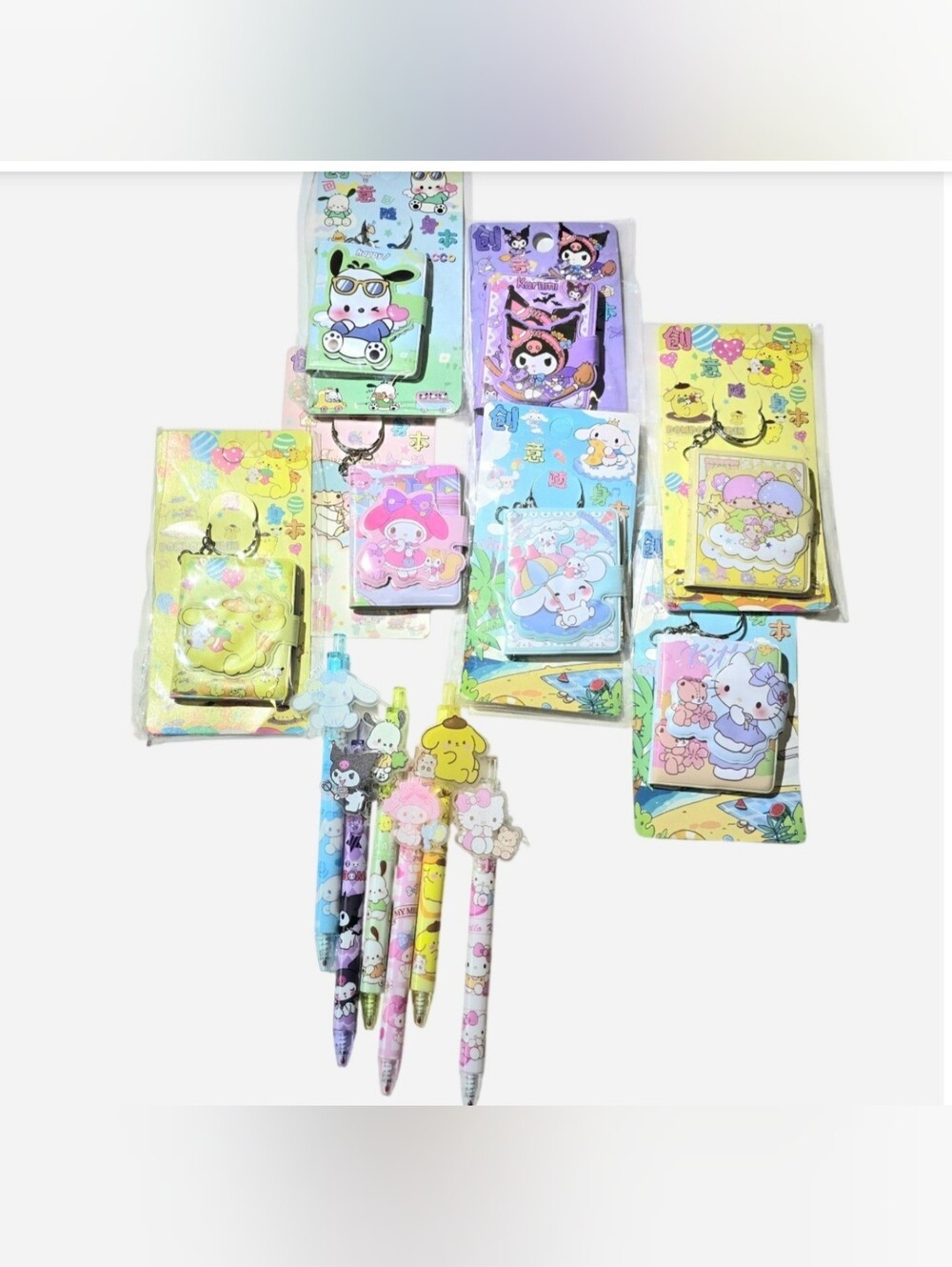 Sanrio Hello Kitty & Friends Bundle of 7 Kawaii Mini Notebook Keychains & 6 Pens